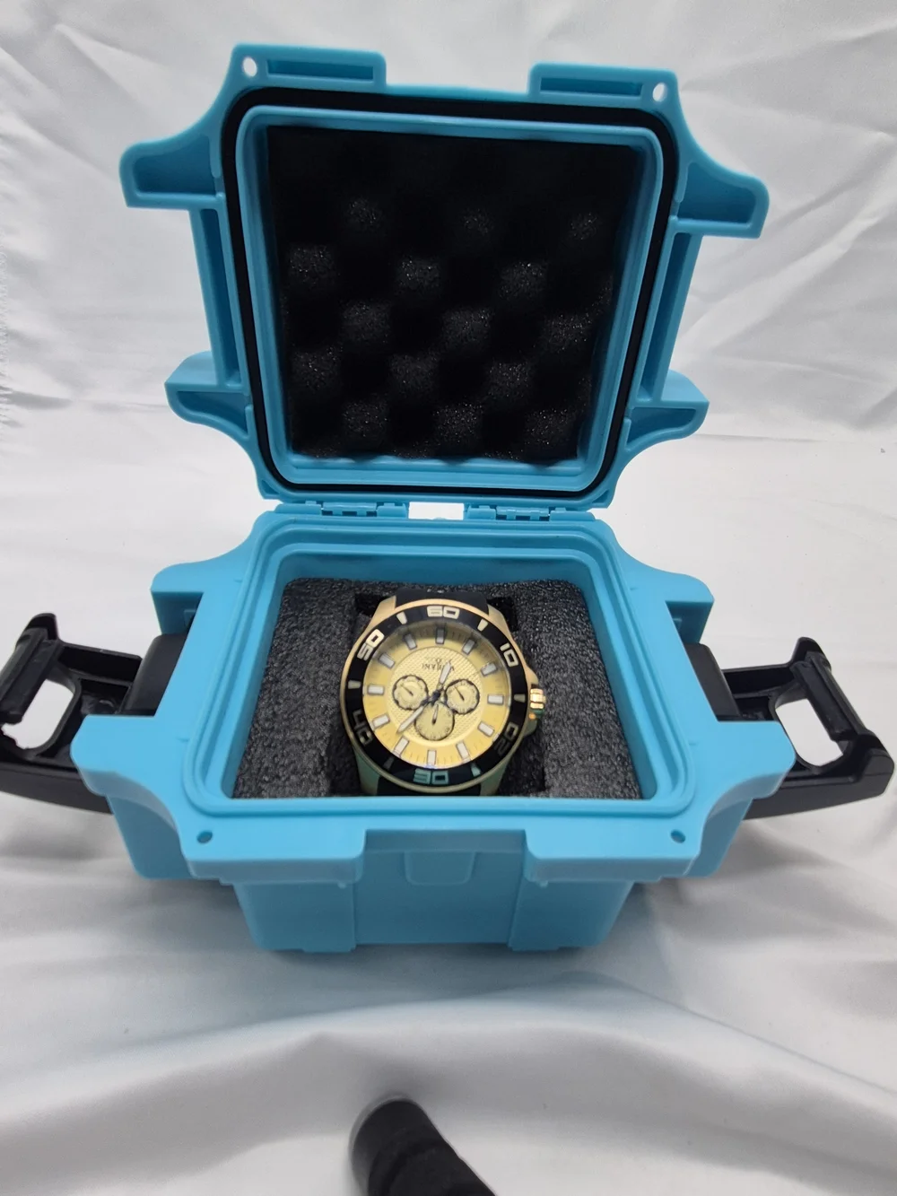 Invicta Gold and Black Chronograph Watch with Turquoise Case